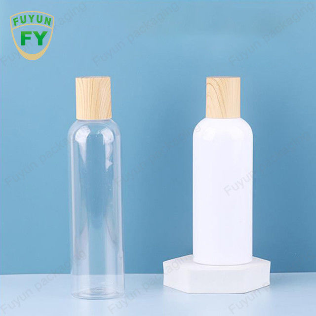Διαφανή μπουκάλια αντλιών της PET 100ml πλαστικά με τη μεταφορά νερού που τυπώνουν το ξύλινο ύφος
